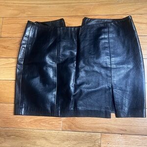 Sexy leather mini skirt by Hannah. Never been worn. Fits like a 2, I’m a zero!